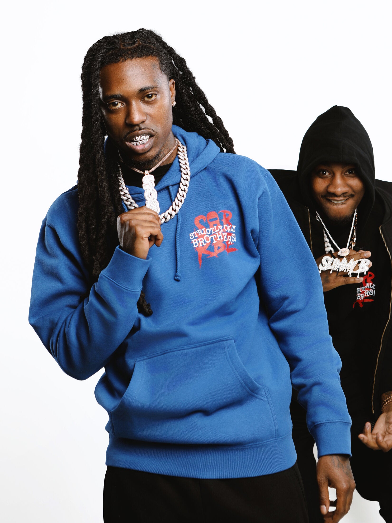 SOB x RBE artists wearing Strictly Only Brothers hoodies